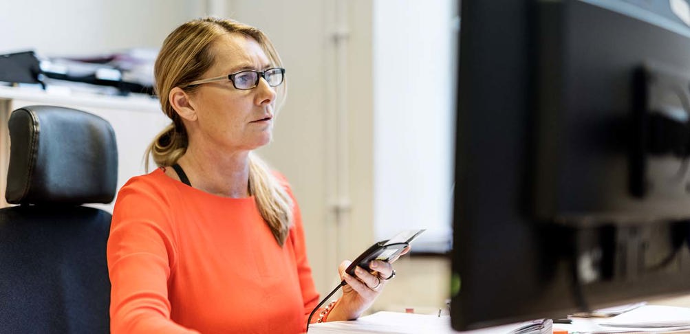 Woman at computer.